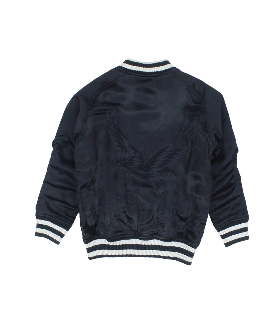 MAHARISHI Tour Jacket B22MH5220 features signature embroidery on a classic souvenir silhouette, blending military style with sustainable design.