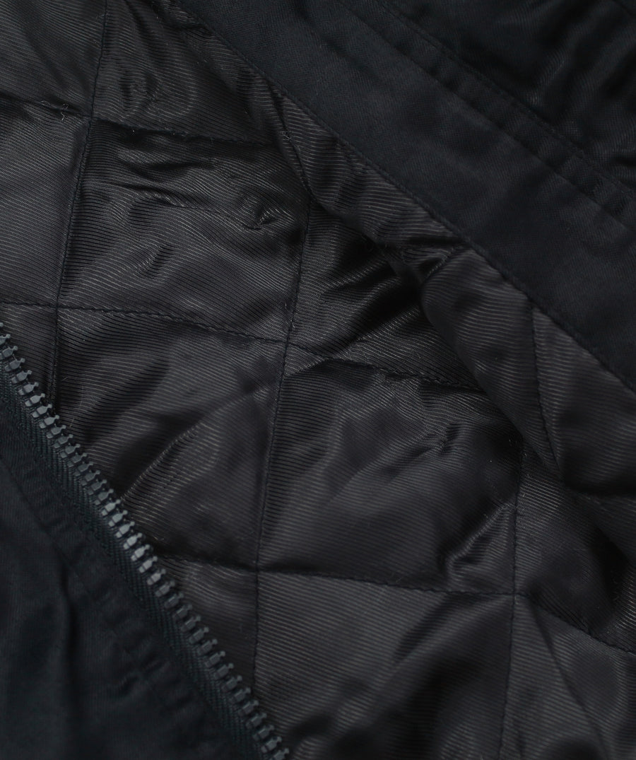 MAHARISHI Tour Jacket B22MH5220 features signature embroidery on a classic souvenir silhouette, blending military style with sustainable design.