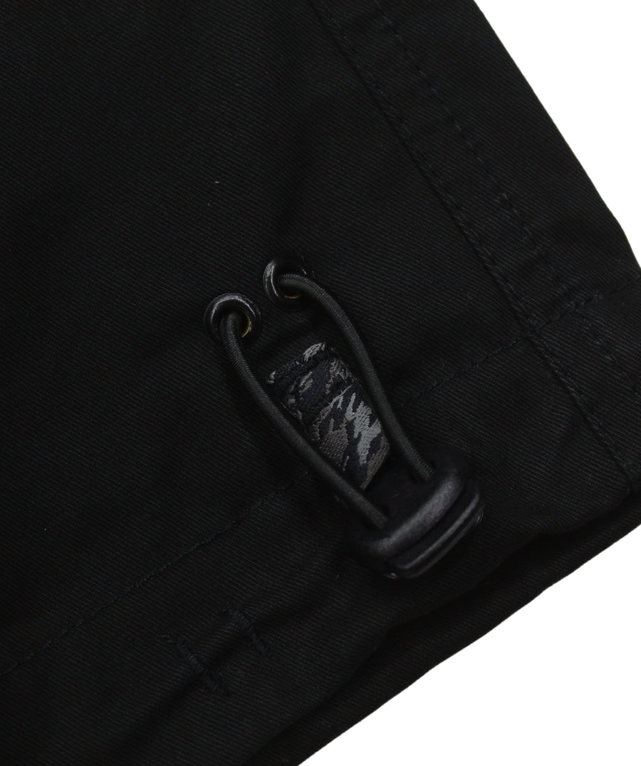 The Maharishi Original Snopants B01MH5406 feature a relaxed fit, Snocord® adjustability, and durable fabric—perfect for versatile, everyday wear.