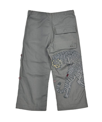 The Maharishi Kid's Tiger Snopants 5508 feature bold tiger embroidery, adjustable waistband, and durable fabric—perfect for stylish, everyday adventure.