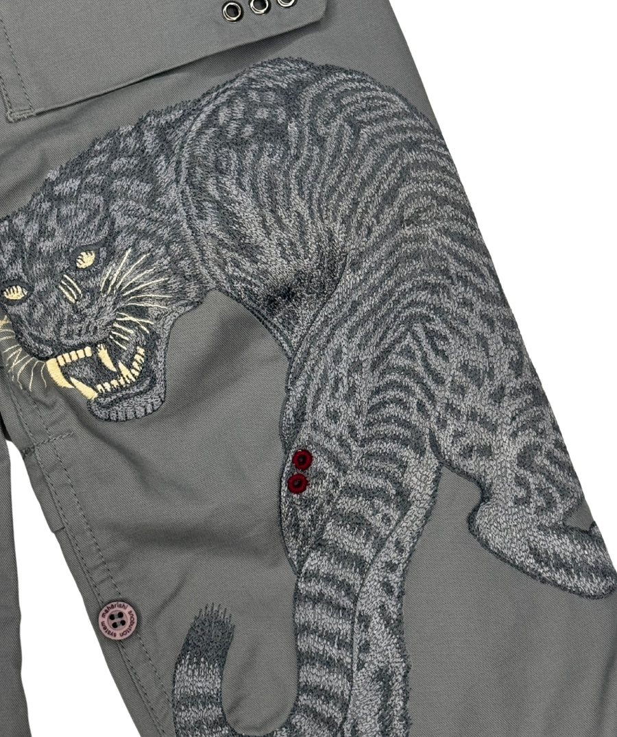 The Maharishi Kid's Tiger Snopants 5508 feature bold tiger embroidery, adjustable waistband, and durable fabric—perfect for stylish, everyday adventure.