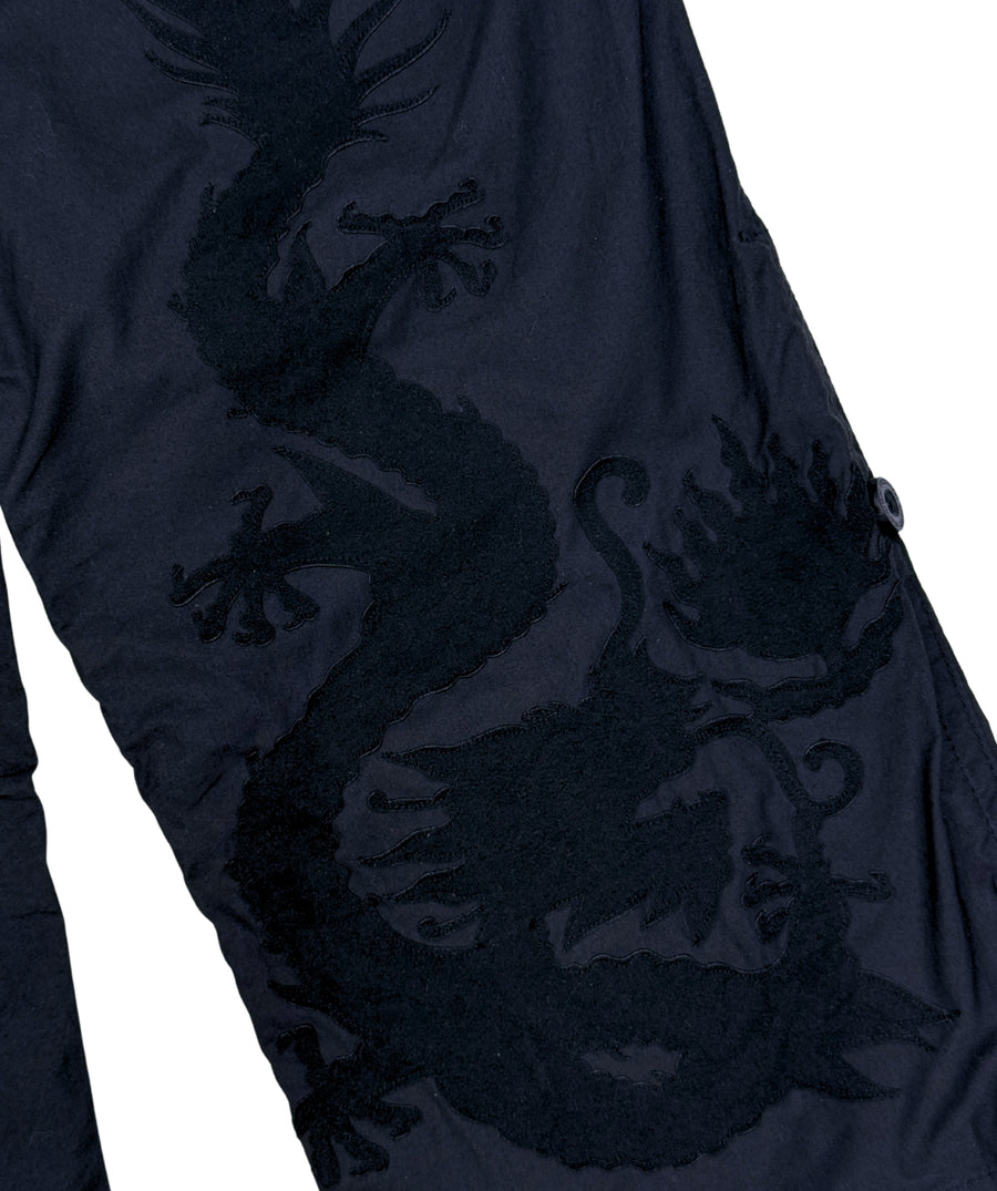 The Maharishi Dragon Boys Snopants 5512 feature bold dragon embroidery, adjustable fit, and durable fabric—perfect for comfort and standout street style.