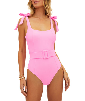 Ribbed swimsuit with tie shoulder straps, removable soft cups, a shelf bra, and optional belt. Offers a stylish silhouette with moderate, comfortable coverage.