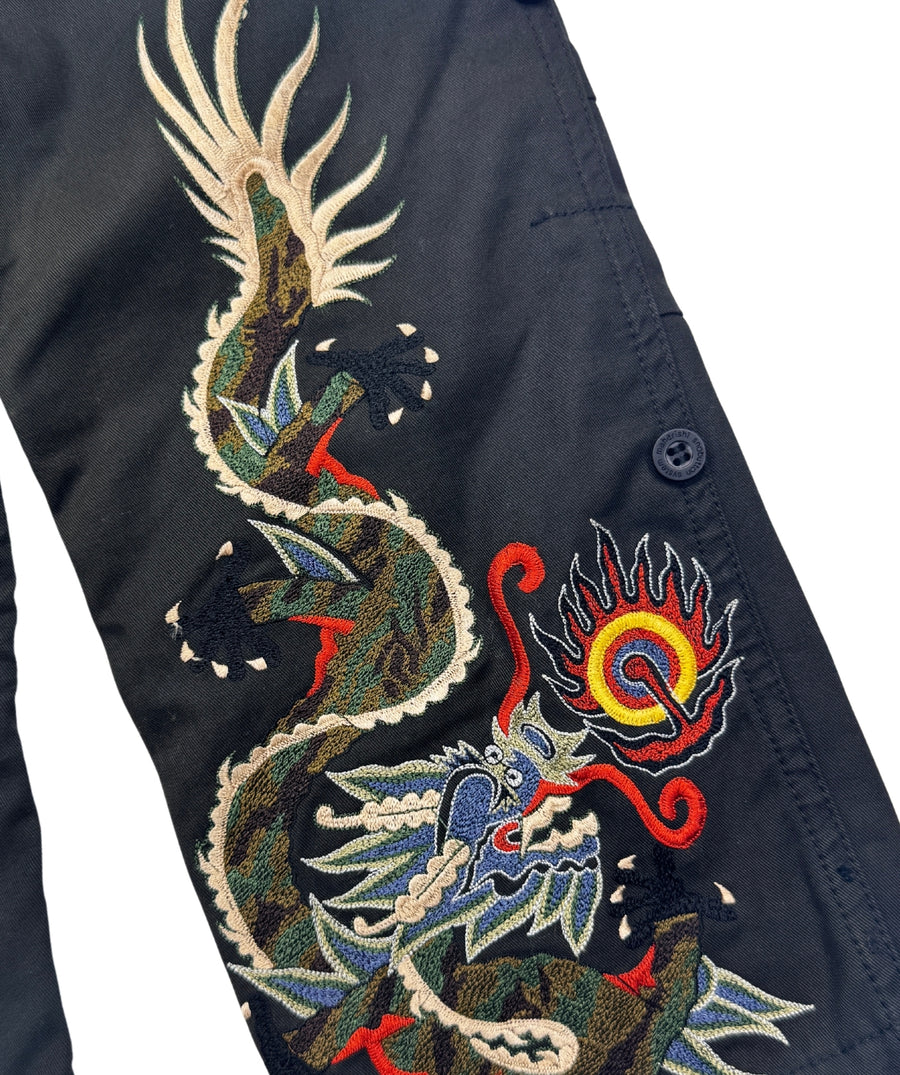 The Maharishi Dragon Boys Snopants 1115 feature detailed dragon embroidery, adjustable waistband, and durable fabric—perfect for bold, everyday style.