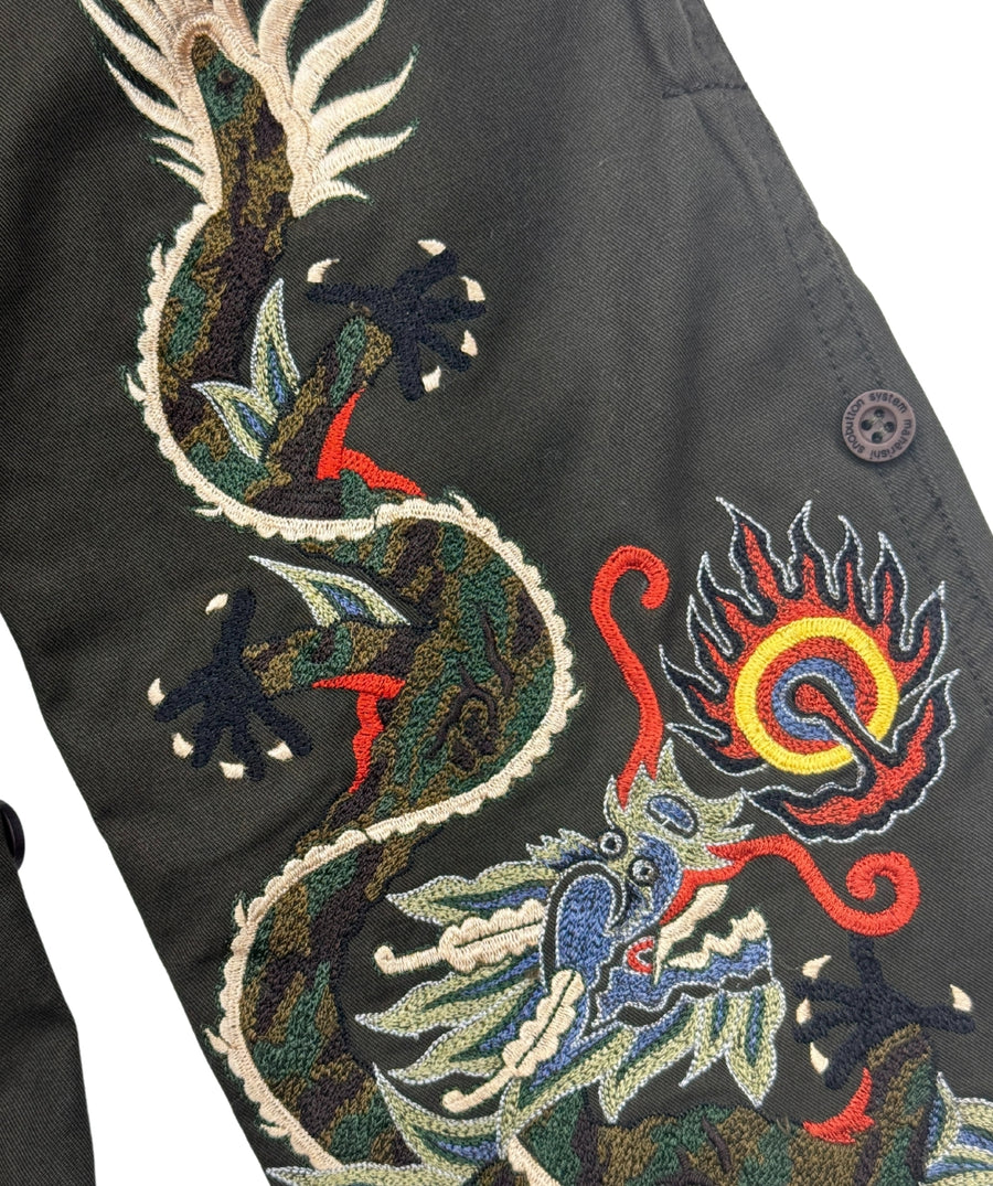 The Maharishi Dragon Boys Snopants 1115 feature detailed dragon embroidery, adjustable waistband, and durable fabric—perfect for bold, everyday style.