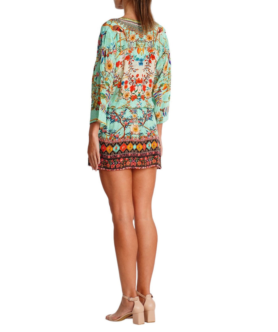 LA MODA Tropical Diva Tunic Dress 25039 TU – A vibrant tunic dress featuring a bold tropical print, lightweight fabric, and a relaxed yet stylish fit, perfect for resort wear and warm-weather outings