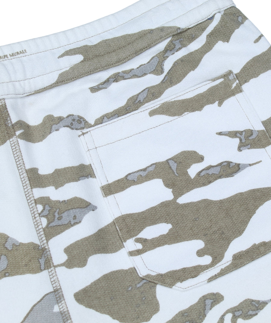 The MAHARISHI Camo Sweatshorts B11MH5504 feature a bold camo print, soft cotton fabric, and elastic waistband—perfect for laid-back, everyday comfort.