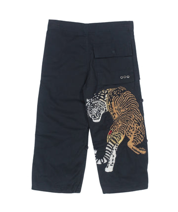 The Maharishi Kid's Tiger Snopants 5508 feature bold tiger embroidery, adjustable waistband, and durable fabric—perfect for stylish, everyday adventure.