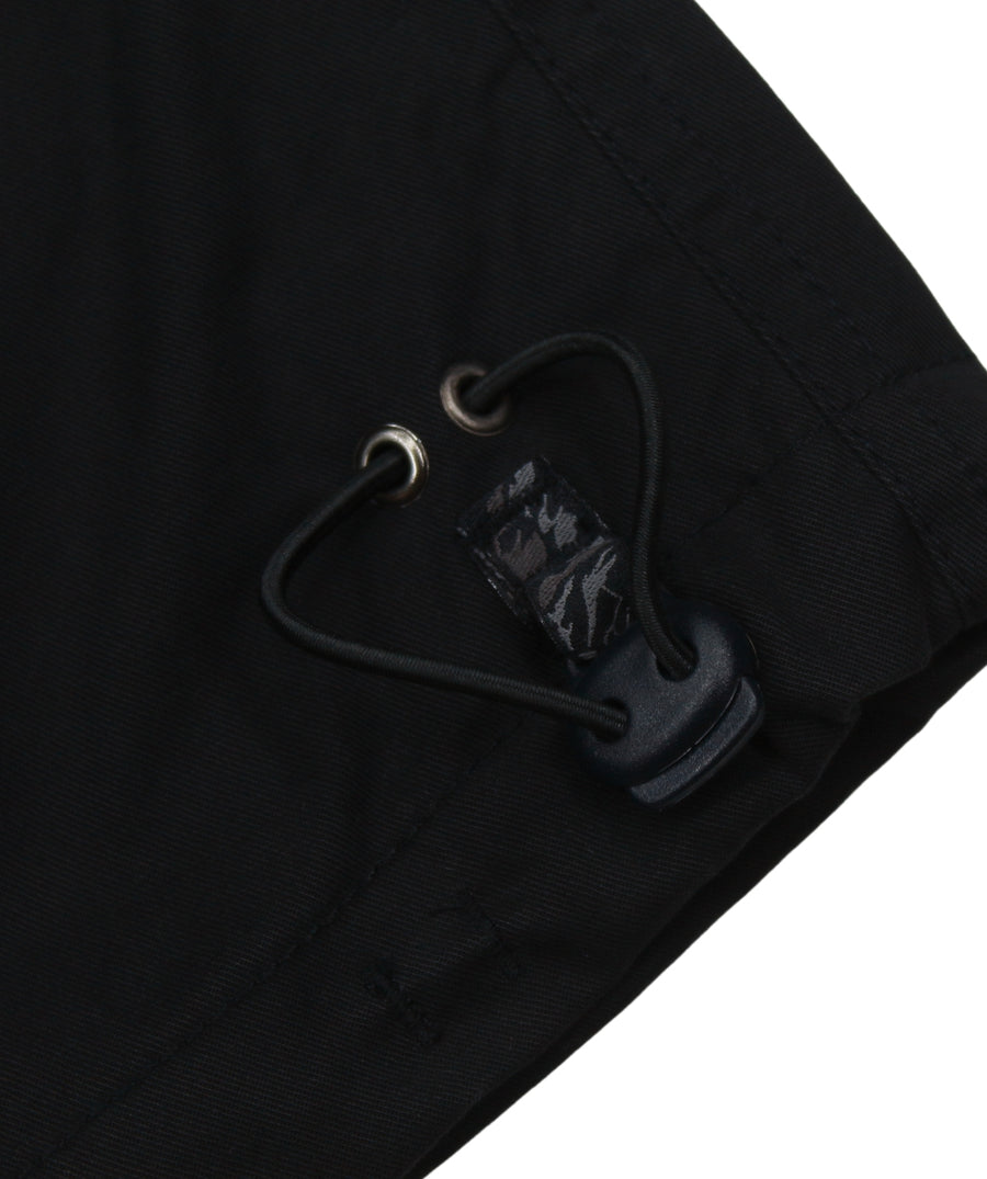 The Maharishi Kid's Tiger Snopants 5508 feature bold tiger embroidery, adjustable waistband, and durable fabric—perfect for stylish, everyday adventure.