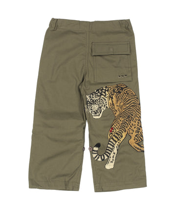 The Maharishi Kid's Tiger Snopants 5508 feature bold tiger embroidery, adjustable waistband, and durable fabric—perfect for stylish, everyday adventure.