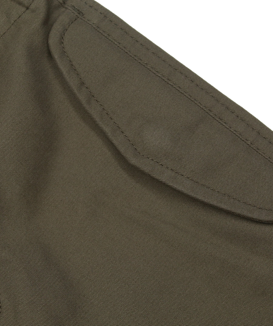 The Maharishi Kid's Tiger Snopants 5508 feature bold tiger embroidery, adjustable waistband, and durable fabric—perfect for stylish, everyday adventure.