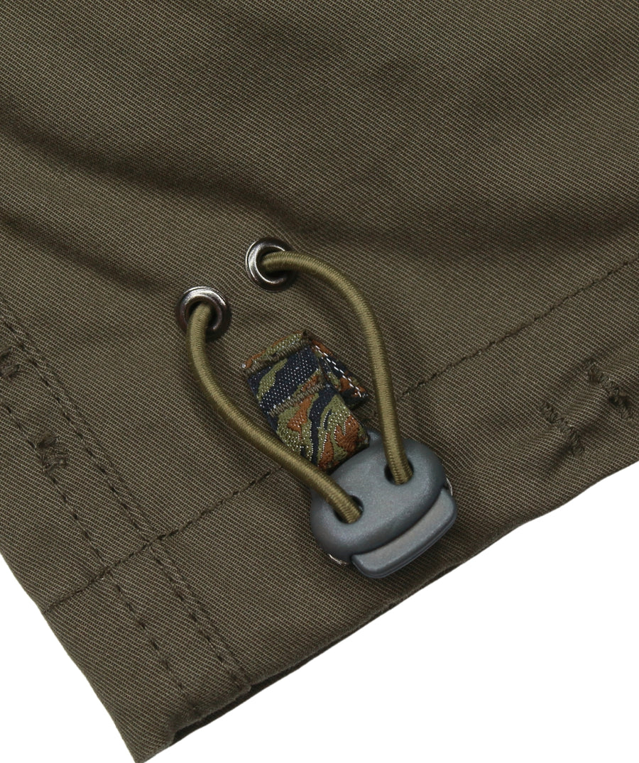 The Maharishi Kid's Tiger Snopants 5508 feature bold tiger embroidery, adjustable waistband, and durable fabric—perfect for stylish, everyday adventure.