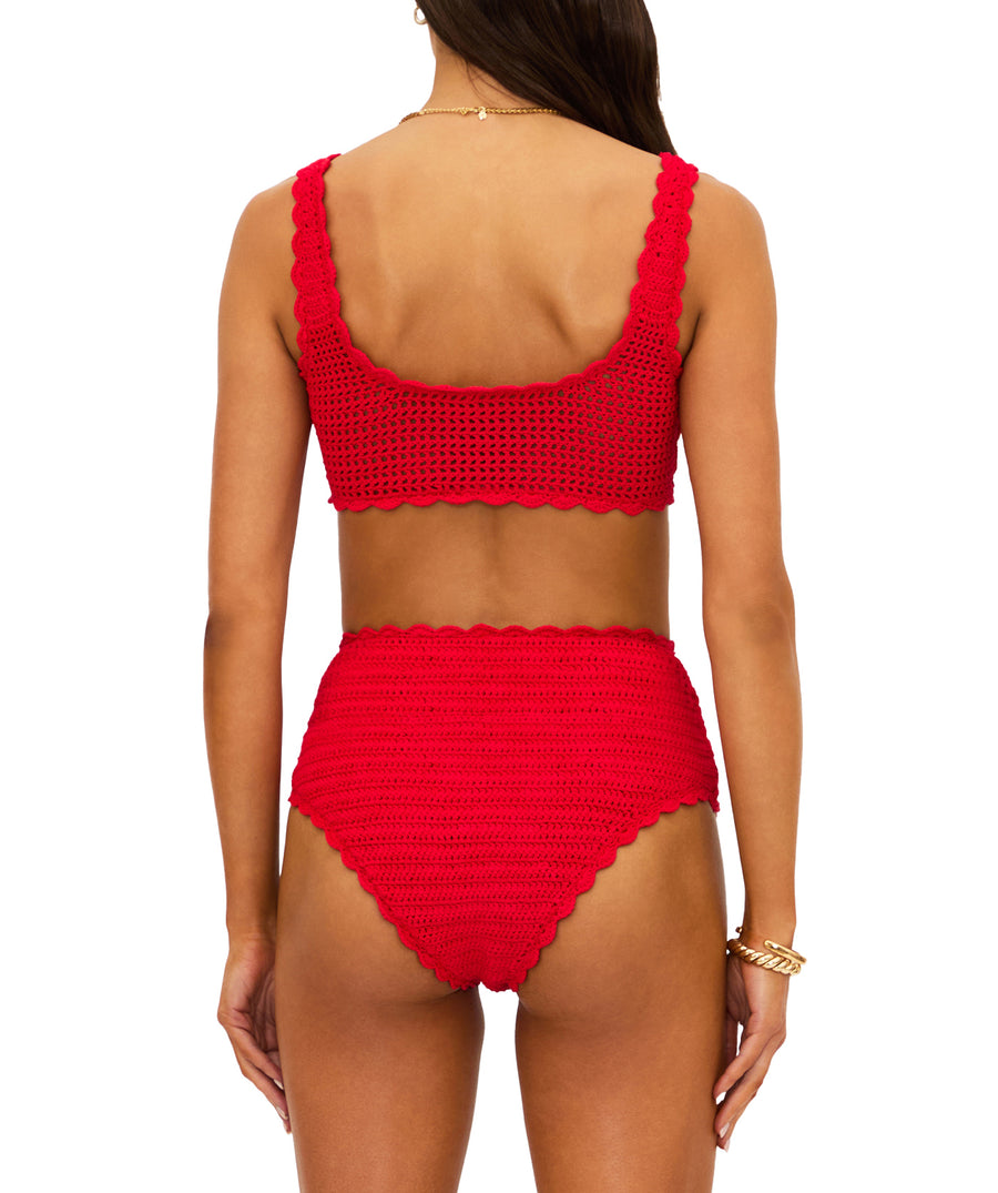 Ruby-red crochet set featuring a cropped square-neck top and high-waist bottoms with scalloped edges. Fully lined, feminine, and vintage-inspired for chic wear.