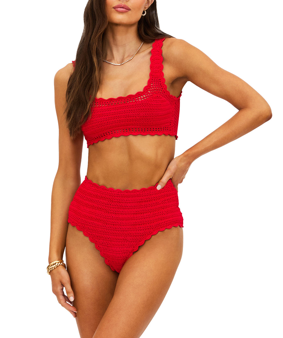 Ruby-red crochet set featuring a cropped square-neck top and high-waist bottoms with scalloped edges. Fully lined, feminine, and vintage-inspired for chic wear.