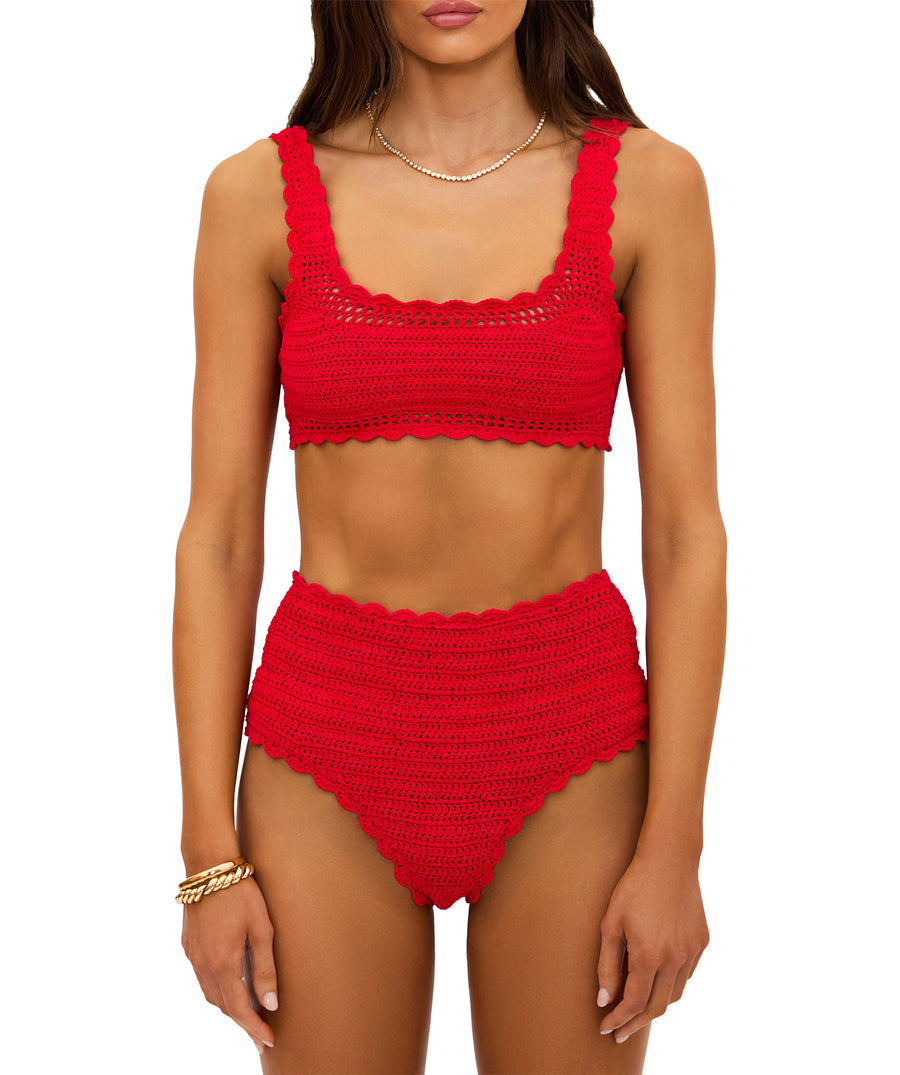 Ruby-red crochet set featuring a cropped square-neck top and high-waist bottoms with scalloped edges. Fully lined, feminine, and vintage-inspired for chic wear.