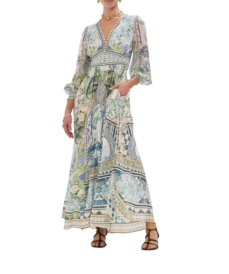 CAMILLA Jardim Party Long Dress 00033708 – A striking long dress adorned with the vivid Jardim Party print, luxurious embellishments, and a graceful flowing design