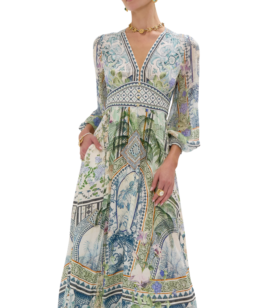 CAMILLA Jardim Party Long Dress 00033708 – A striking long dress adorned with the vivid Jardim Party print, luxurious embellishments, and a graceful flowing design