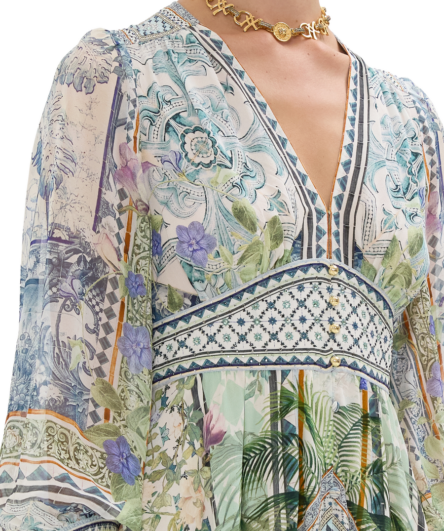 CAMILLA Jardim Party Long Dress 00033708 – A striking long dress adorned with the vivid Jardim Party print, luxurious embellishments, and a graceful flowing design