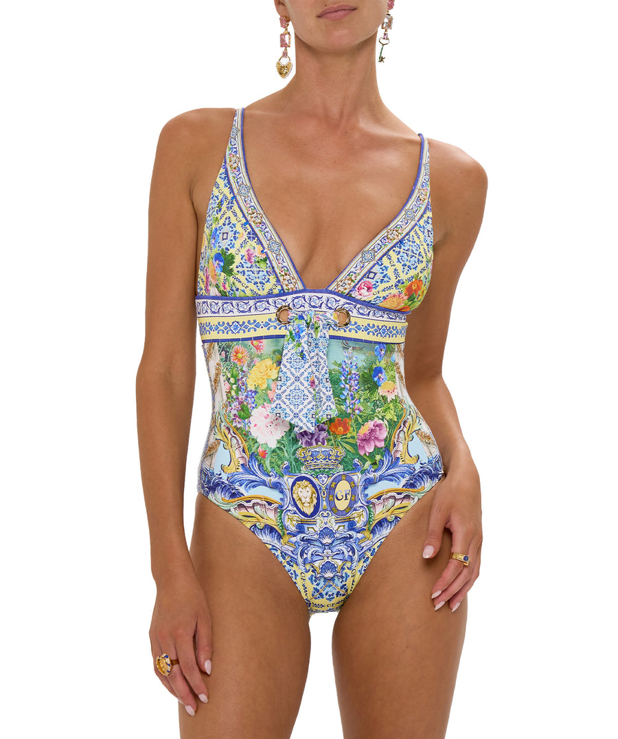 CAMILLA Wall To Wall Wonders One Piece Swimsuit 00034216 – A striking one-piece swimsuit featuring a vibrant signature print, flattering silhouette, and luxe fabric