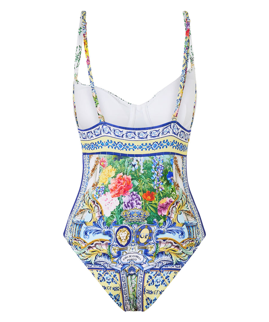 CAMILLA Wall To Wall Wonders One Piece Swimsuit 00034216 – A striking one-piece swimsuit featuring a vibrant signature print, flattering silhouette, and luxe fabric