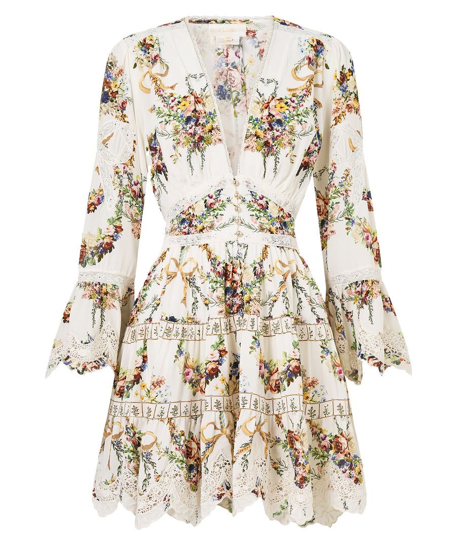 Own the spotlight in the CAMILLA Dressing Room Drama Short Dress 00034739 – a bold, theatrical print meets a flirty silhouette for standout style.
