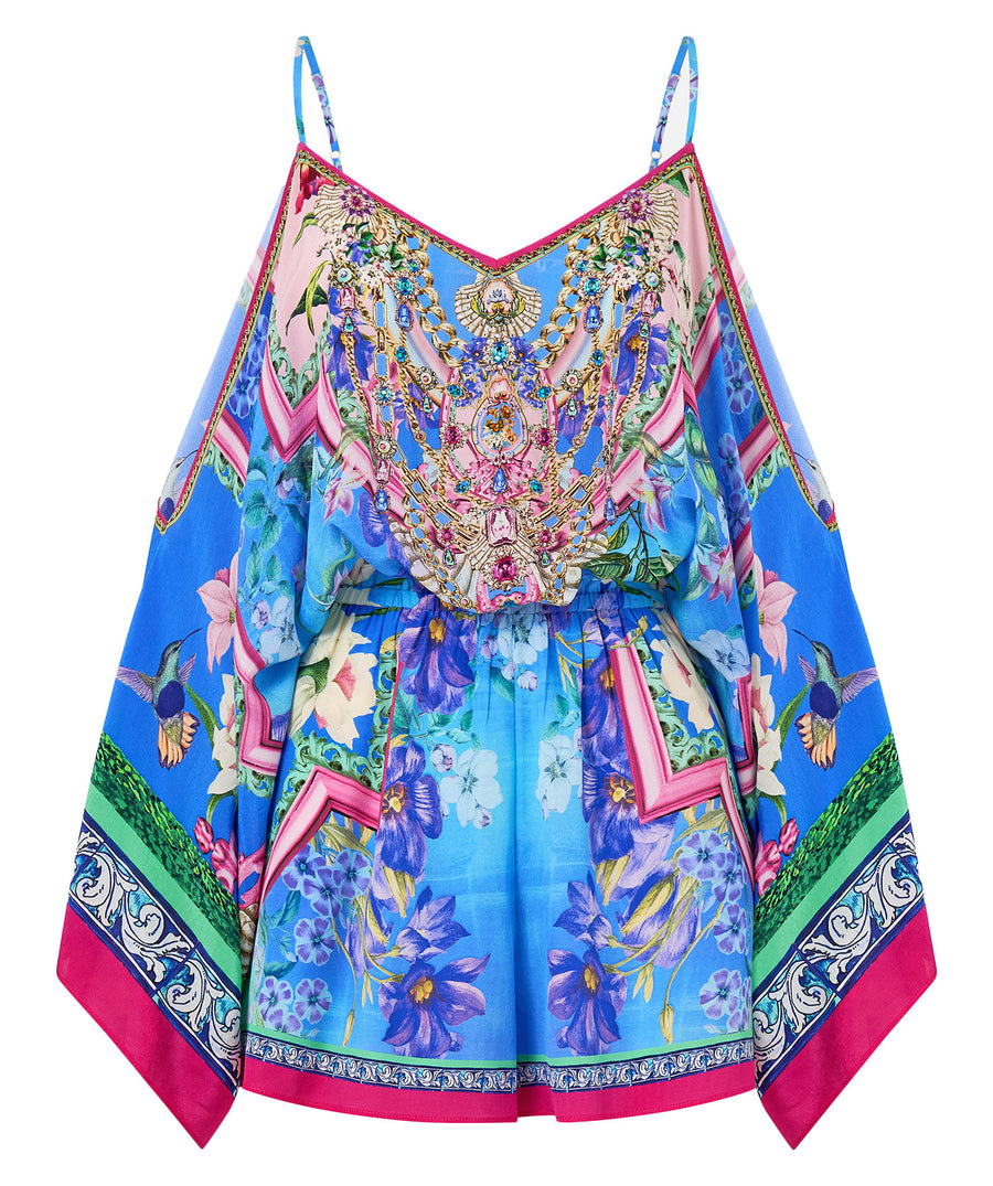 Step into effortless glam with the CAMILLA Spirit Of Santa Maria Drop Shoulder Playsuit 00035442 – bold prints meet relaxed elegance in this luxe resort piece