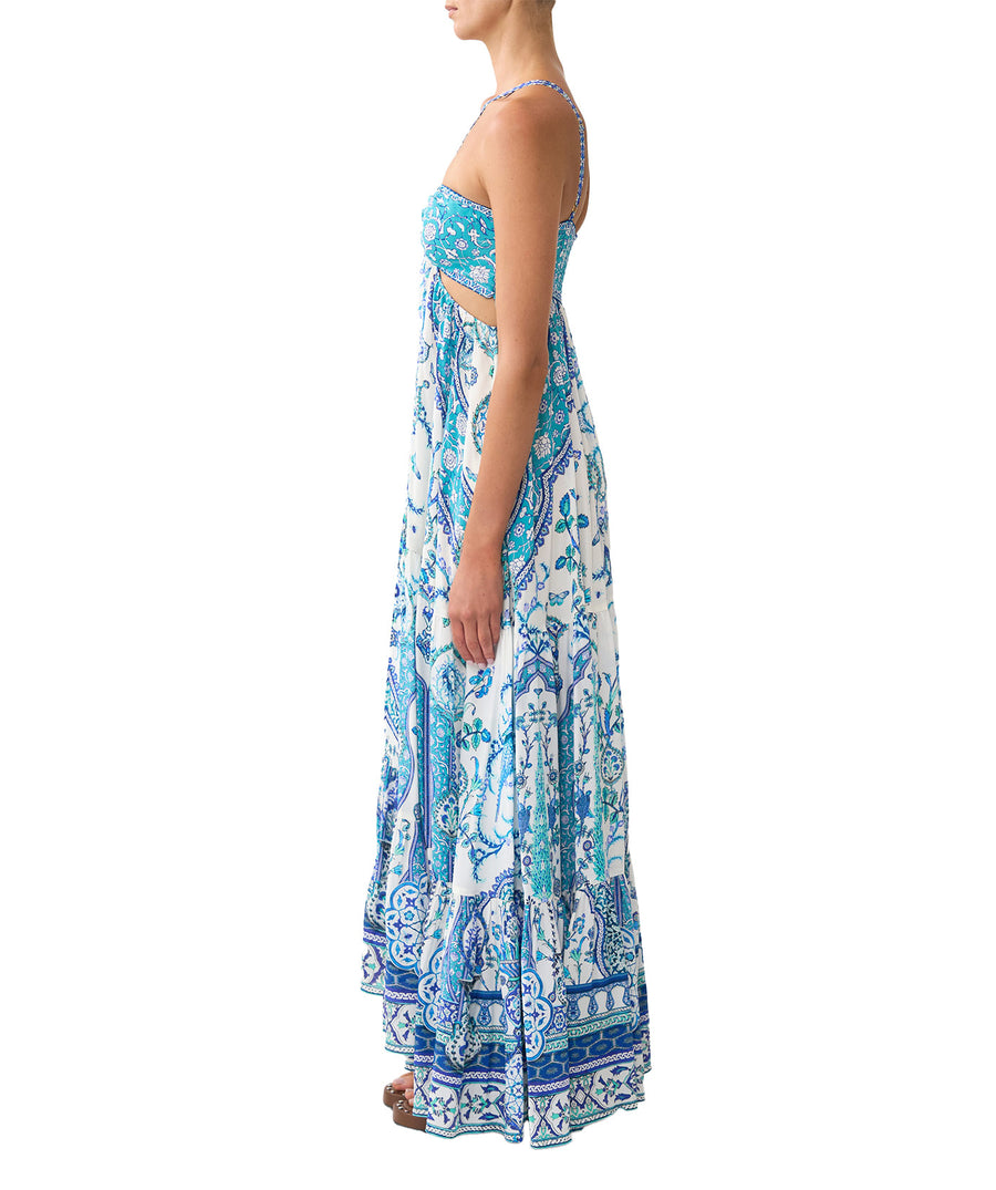 The CAMILLA Isnik Lullaby Cut Out Dress 00036545 showcases bold prints, waist cut-outs, and crystal embellishments—perfect for statement summer style.