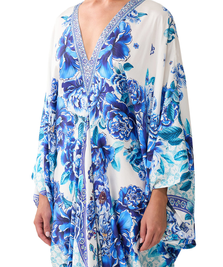 Embrace effortless elegance with CAMILLA A Ceramic Garden T-Shape Long Kaftan 00037043 – flowing silhouette, vibrant print, and luxurious resort style.