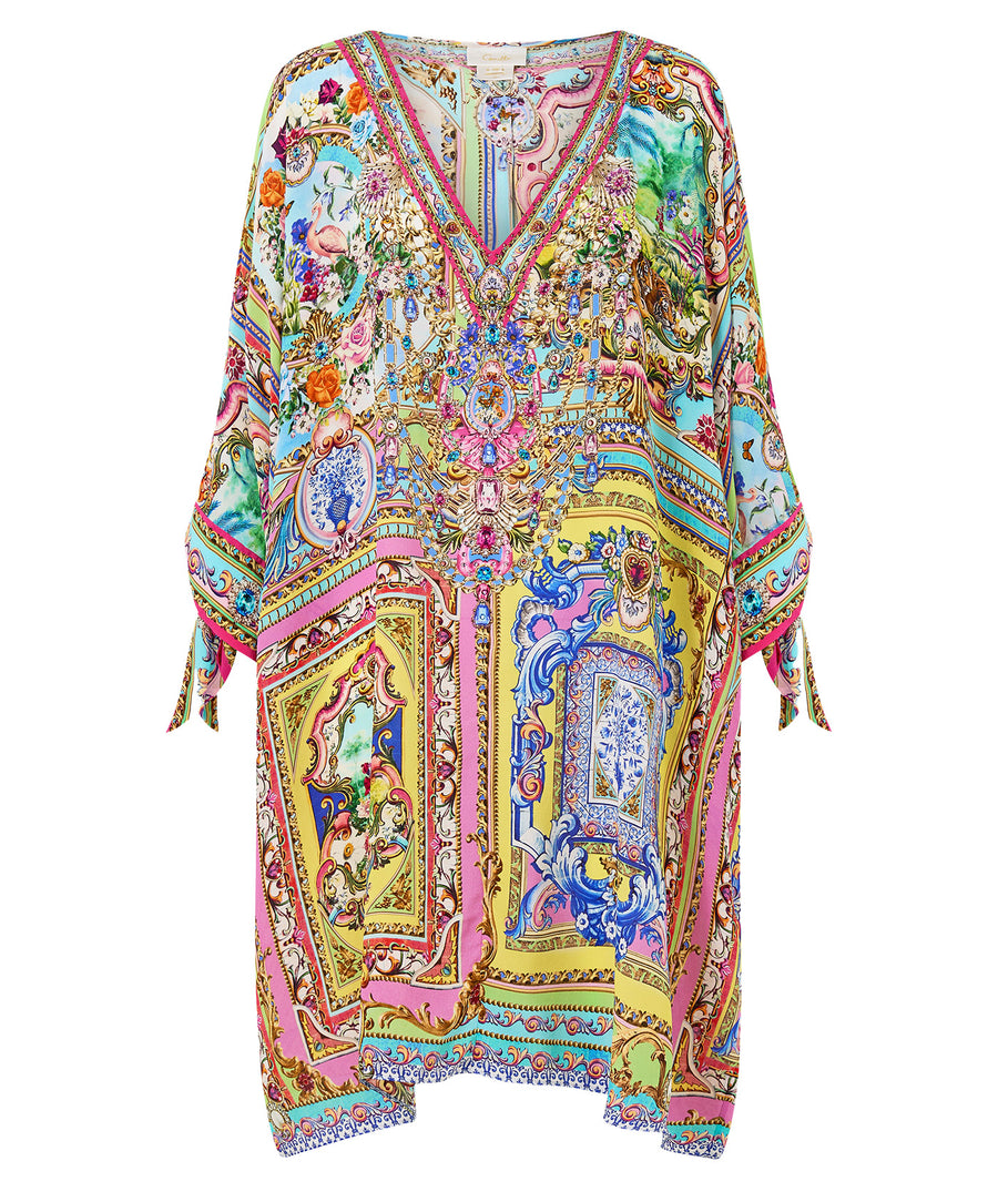 Embrace boho-luxe style with the CAMILLA Spirit Of Santa Maria Kaftan 00037784 – a flowing silhouette adorned with vibrant prints and signature detailing.