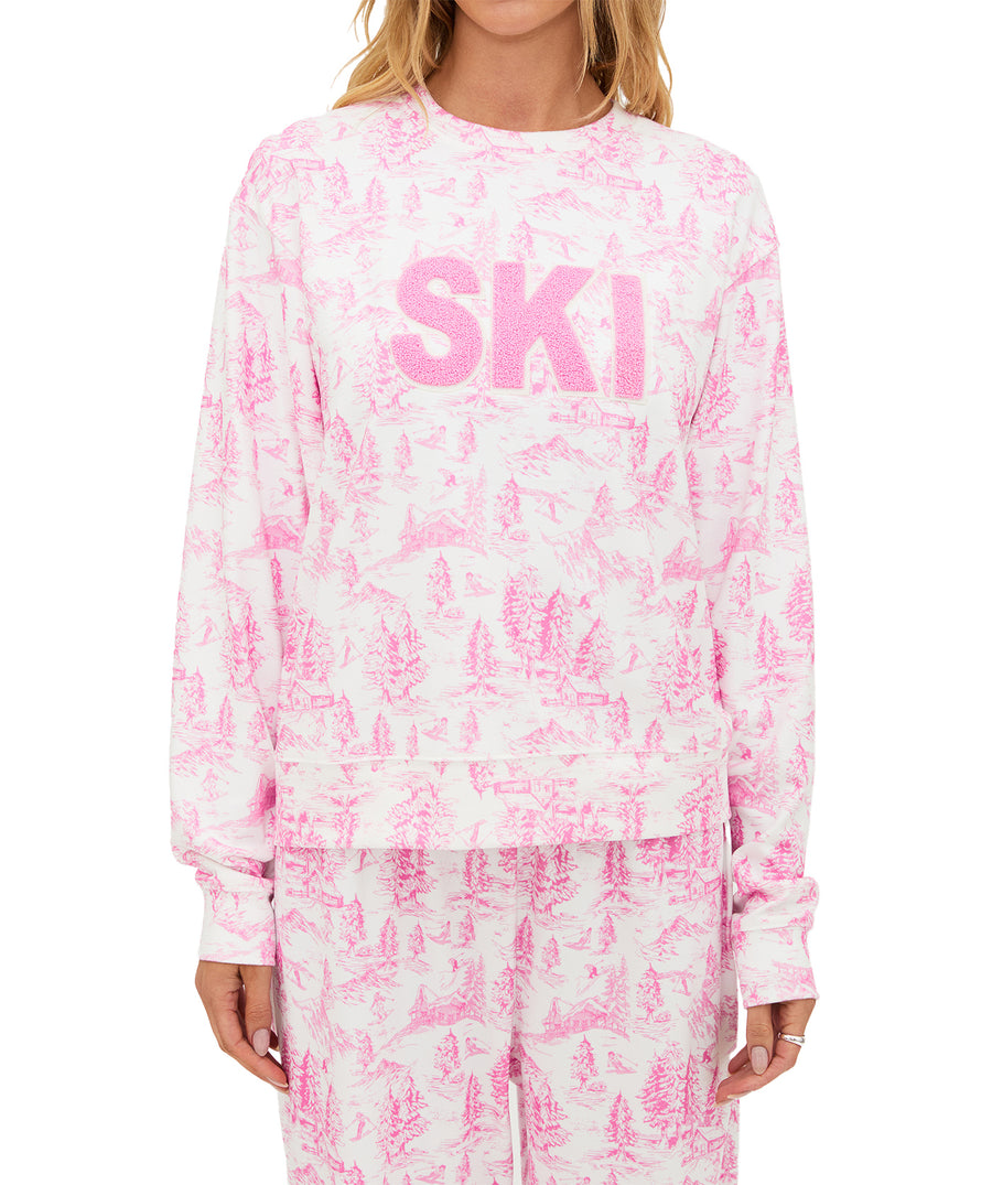Ultra-soft fleece loungewear set with pink toile print, SKI chenille patch, comfy elastic waist, pockets, and relaxed fit for cozy cold-weather wear.