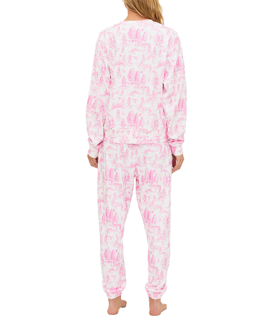 Ultra-soft fleece loungewear set with pink toile print, SKI chenille patch, comfy elastic waist, pockets, and relaxed fit for cozy cold-weather wear.
