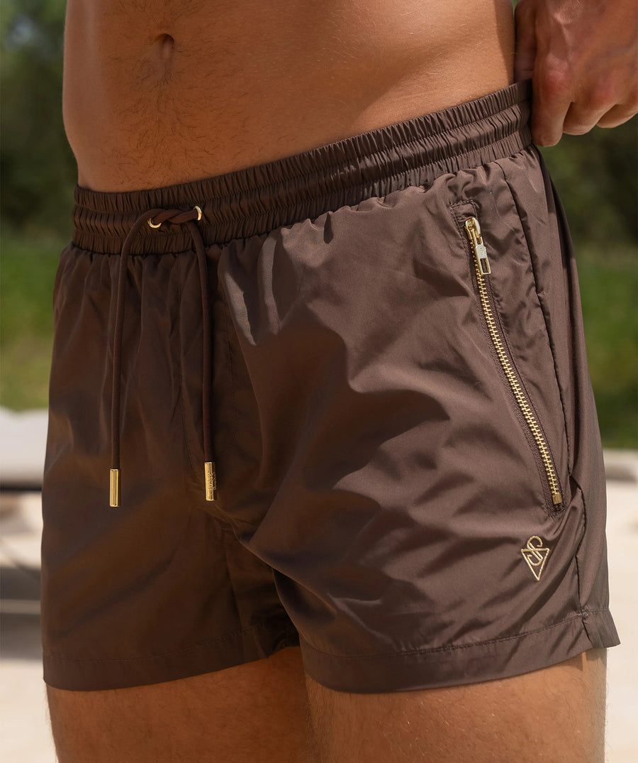 Elevate your swim style with the SINK Signature Swim Shorts SSW-SIG-BROWN-S — quick-dry, lightweight, and crafted for a sleek, modern beach-to-pool look.