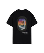 HOMIES MARBELLA Videogame 6.0 tee in black featuring a bold back graphic by a local artist. Soft jersey cotton, oversized silhouette and casual comfort.