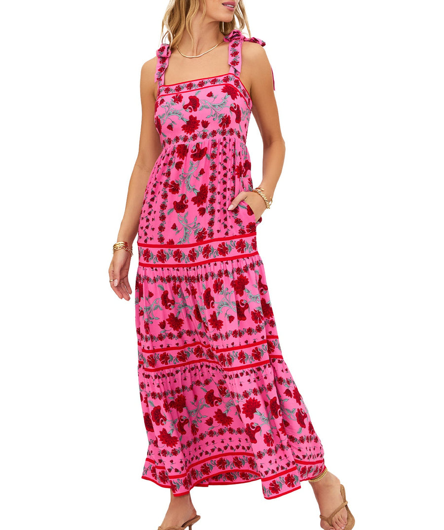 Elegant floral maxi featuring a square neckline, ruffled tie straps, pockets, tiered skirt, and a smocked back for the perfect fit. 100% rayon.