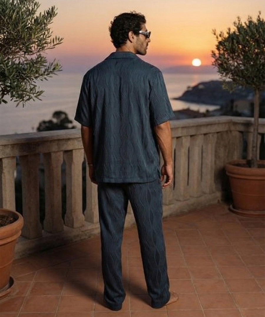 Soft, breathable wave-textured set with a camp-collar shirt, pockets, and comfy elastic pants. Ideal for vacations, resort looks, and relaxed everyday outfits.